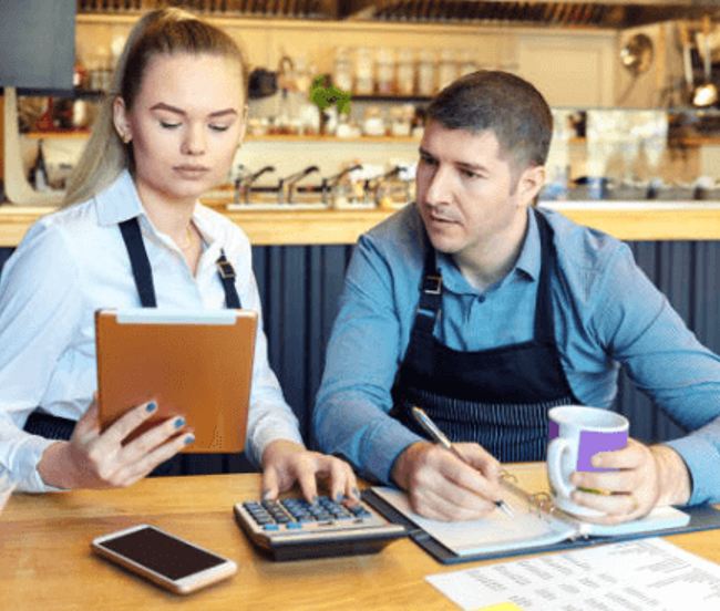 Staff discussing cash flow