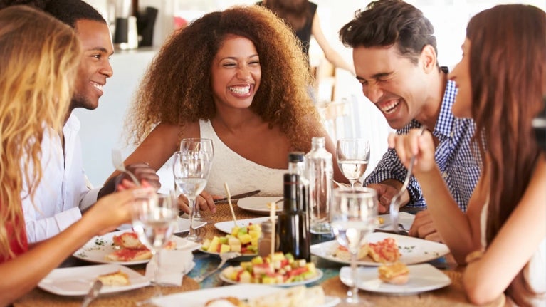 Friends Eating Plant Based At A Restaurant
