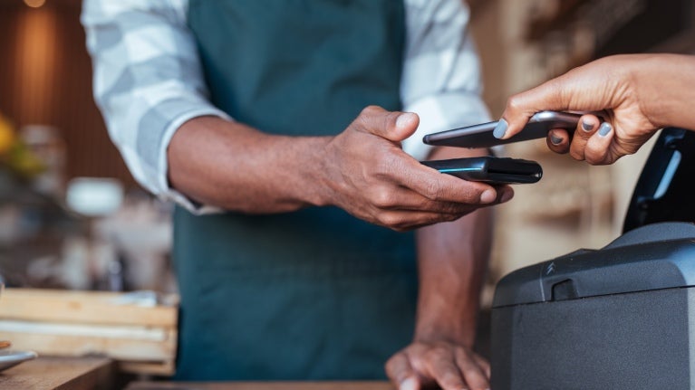 person using contactless payment