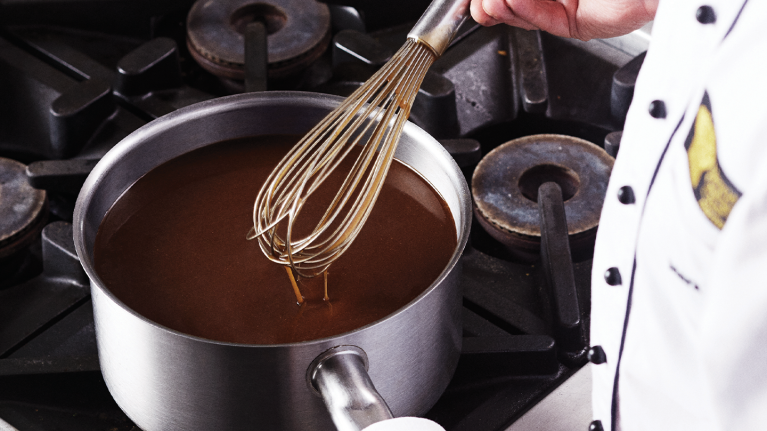 chef making gravy