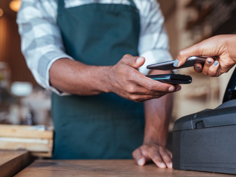 person using contactless payment