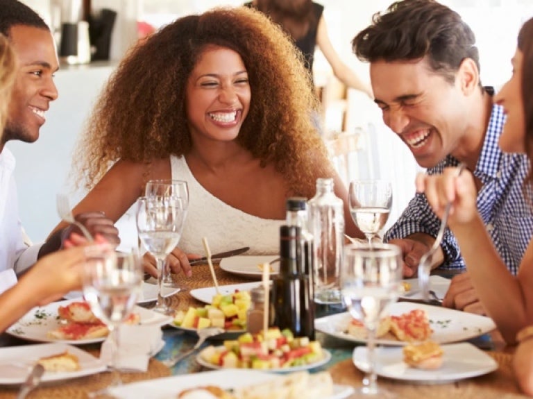Friends Eating Plant Based At A Restaurant