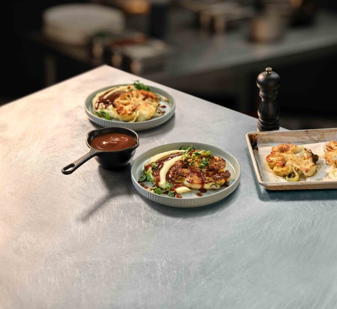 A beautifully charred cauliflower steak plated over lusciously silky and thick MAGGI mash with MAGGI SUPREME GRAVY MIX