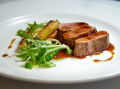 Lamb Saddle, Parsnip Puree, Roasted Jerusalem Artichoke, Peas and Chive Oil
