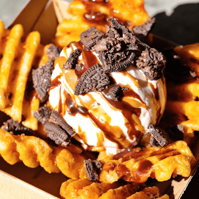 Waffle fries topped with ice cream, Hershey’s, Lotus Biscoff sauce, and crumbled Oreos from&nbsp;Mr. Burger, Victoria
